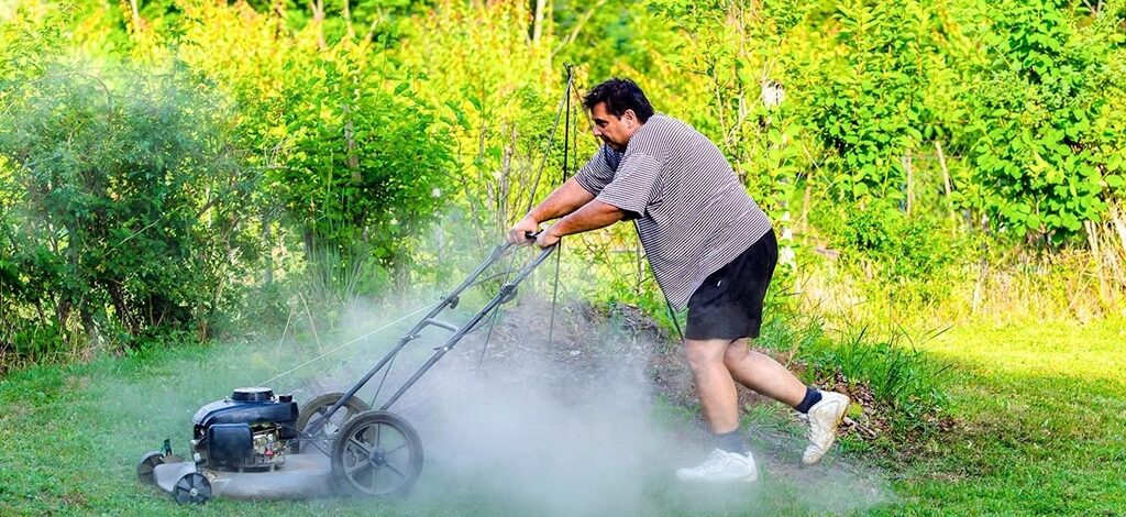 How do I stop my lawn mower from smoking?