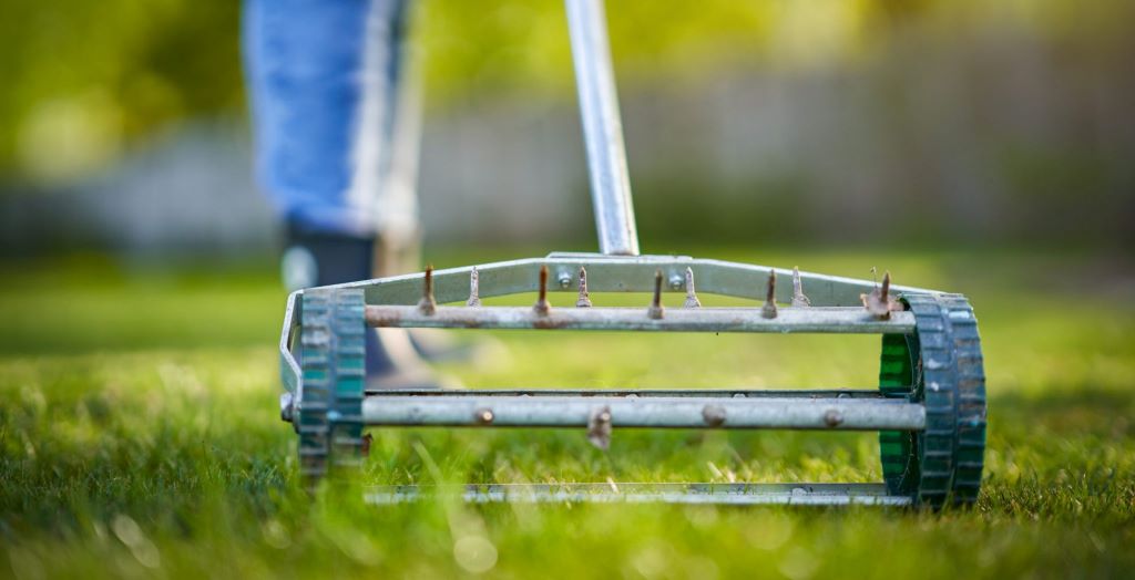 Why Lawn Aeration Is the Secret to Thicker Grass